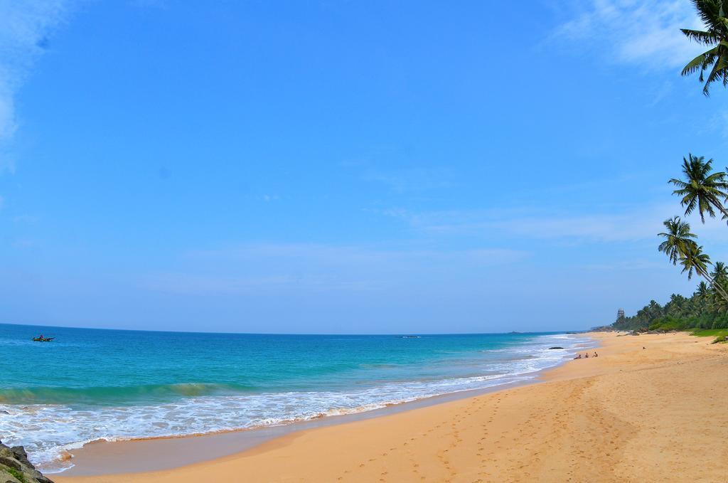 Rainbow Beach Hotel ฮิกคาดูวา ภายนอก รูปภาพ
